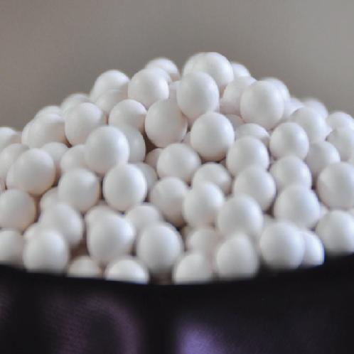 Alkaline ceramic ball